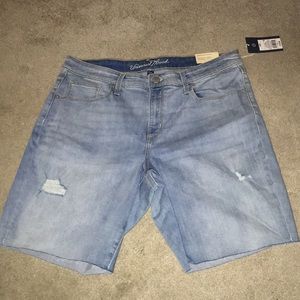 Mid-rise Bermuda Distressed Jean Shorts